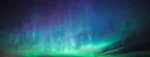 aurora with silhouettes of meditators and sacred geometry symbolizing small energetic shifts make a big difference