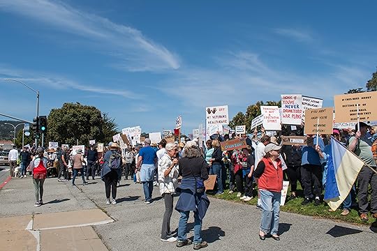 Hundreds of people protested in Monterey on Saturday, one of...