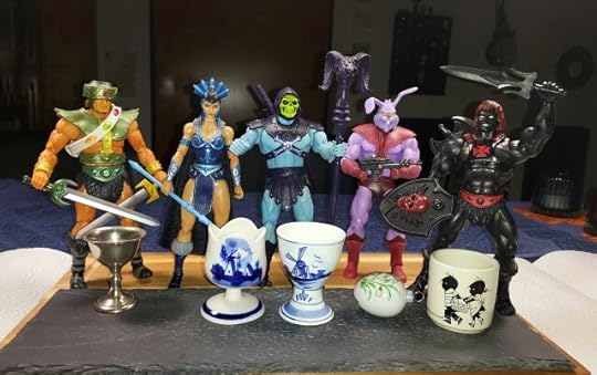 Tri-Klops, Evil-Lyn, Skeletor, Plundor and Anti-Eternia He-Man admire some vintage egg cups.