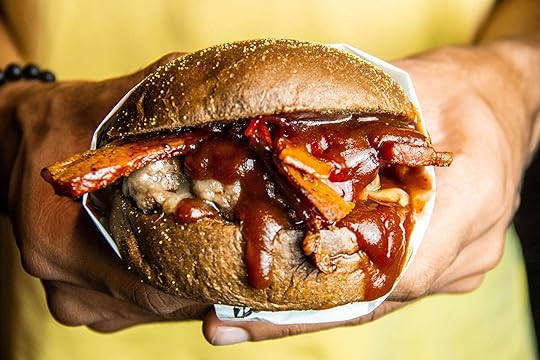 Image of a man holding a BBQ sandwich. Learn to effectively control your big emotions and behaviors with the help of an adult intensive outpatient program in Houston, TX.