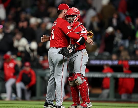 Cincinnati Reds relief pitcher Emilio Pagán #15 and catcher Jose...