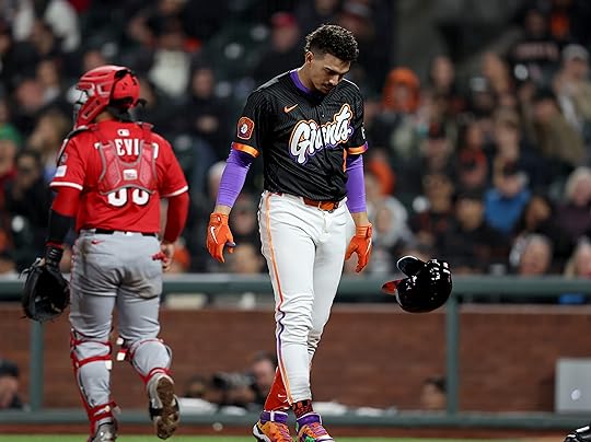 San Francisco Giants’ Willy Adames #2 tosses his helmet after...