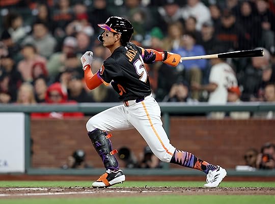 San Francisco Giants’ Jung Hoo Lee #51 follows through on...