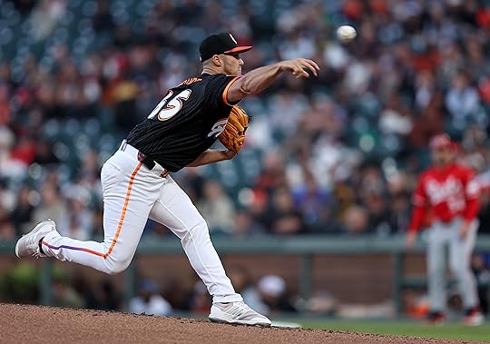 San Francisco Giants starting pitcher Landen Roupp #65 throws against...
