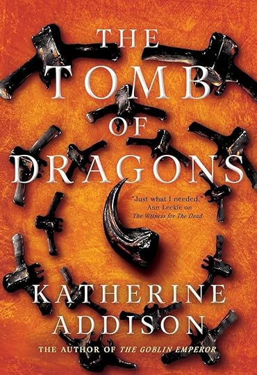 The cover of The Tomb of Dragons by Katherine Addison. Obsidian black dragon bones arranged in a circular pattern on an orange and red background.