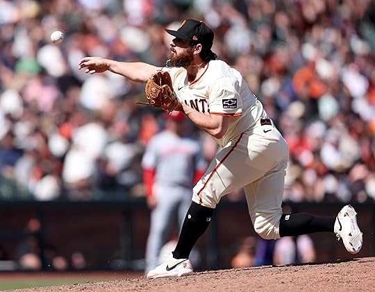 San Francisco Giants relief pitcher Erik Miller #68 throws against...