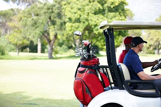 golf cart with two men and bags of clubs