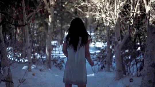 mari as the pit girl stands in snow in yellowjackets