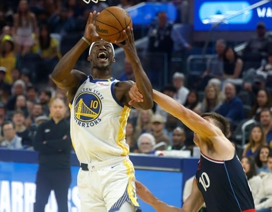 Golden State Warriors' Jimmy Butler III (10) is fouled by Los Angeles Clippers' Bogdan Bogdanović (10) in the second quarter at the Chase Center in San Francisco, Calif., on Sunday, April 13, 2025. (Nhat V. Meyer/Bay Area News Group)
