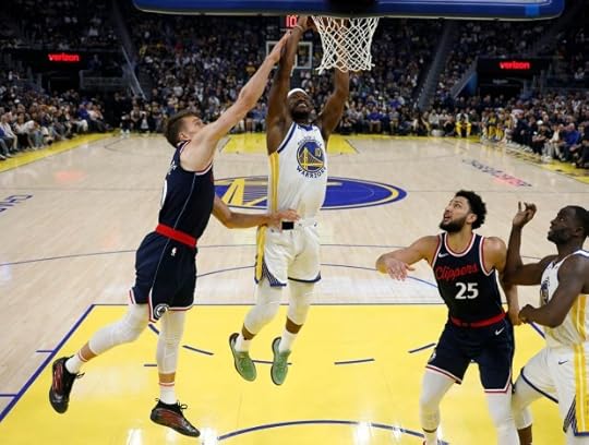 Golden State Warriors' Jimmy Butler III (10) dunks against Los Angeles Clippers' Bogdan Bogdanović (10) in the first half at the Chase Center in San Francisco, Calif., on Sunday, April 13, 2025. (Nhat V. Meyer/Bay Area News Group)