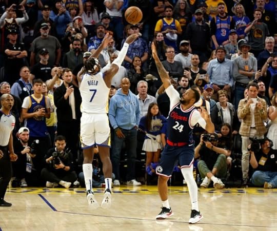 Golden State Warriors' Buddy Hield (7) takes a 3-point basket against Los Angeles Clippers' Norman Powell (24) with three seconds left in overtime at the Chase Center in San Francisco, Calif., on Sunday, April 13, 2025. He missed the basket. (Nhat V. Meyer/Bay Area News Group)
