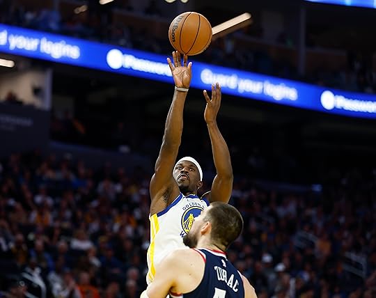 Golden State Warriors’ Jimmy Butler III (10) takes a shot...