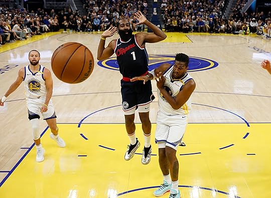 The ball goes out-of-bounds in front of Los Angeles Clippers’...