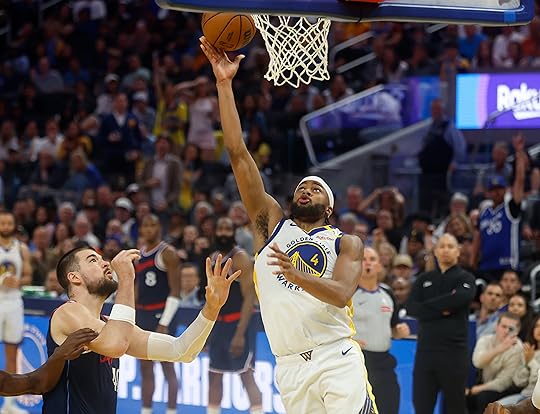 Golden State Warriors’ Moses Moody (4) takes a shot against...
