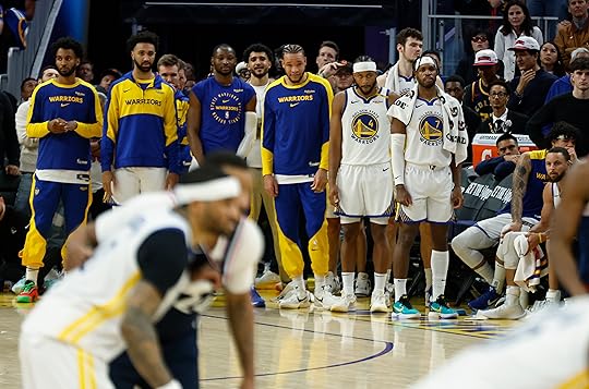 The Golden State Warriors bench watches the final moments of...