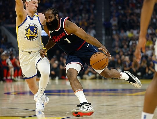 Los Angeles Clippers’ James Harden (1) dribbles against Golden State...