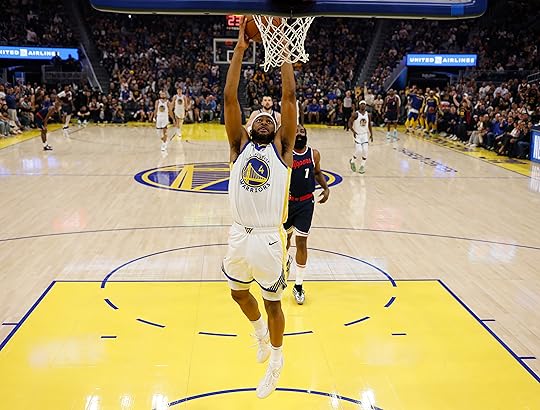 Golden State Warriors’ Moses Moody (4) dunks the ball against...