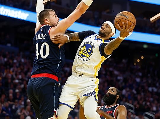 Golden State Warriors’ Gary Payton II (0) takes a shot...