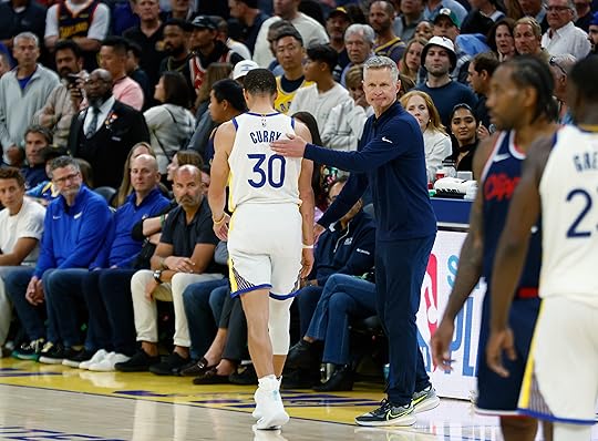 Golden State Warriors’ Stephen Curry (30) heads to the bench...