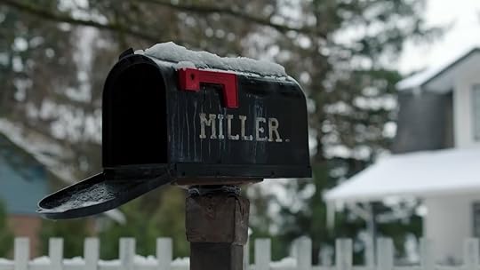 A traditional black mailbox with the name Miller from The Last of Us