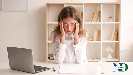 An angry woman wearing a white blouse.