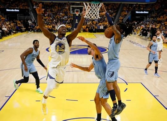 Golden State Warriors' Jimmy Butler III (10) fights for the ball against Memphis Grizzlies' Ja Morant (12) in first half of their NBA play-in tournament game at the Chase Center in San Francisco, Calif., on Tuesday, April 15, 2025. (Nhat V. Meyer/Bay Area News Group)