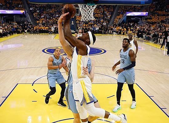 Golden State Warriors’ Jimmy Butler III (10) fights for the...
