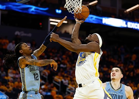 Golden State Warriors’ Jimmy Butler III (10) takes a shot...