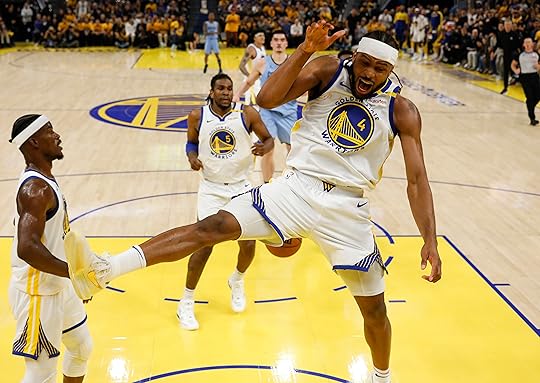 Golden State Warriors’ Moses Moody (4) celebrates his dunk against...