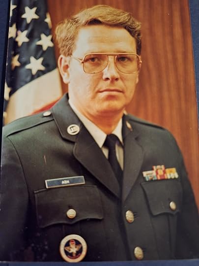A male Air Force servicemember in uniform