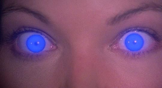 Amy Irving's glowing blue eyes in