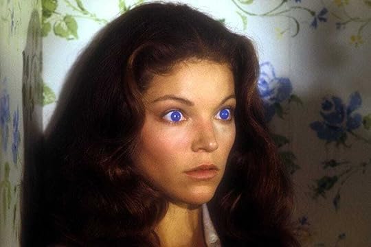 Amy Irving's eyes glowing blue in