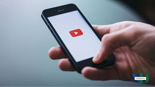 A phone with YouTube displayed.