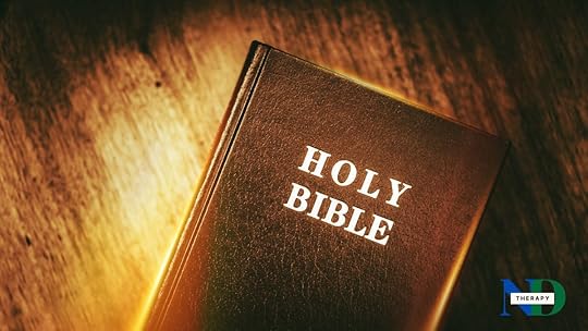 The Bible on a gold and brown background.