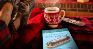 chocolate eclairvoyant book with hot chocolate cozy