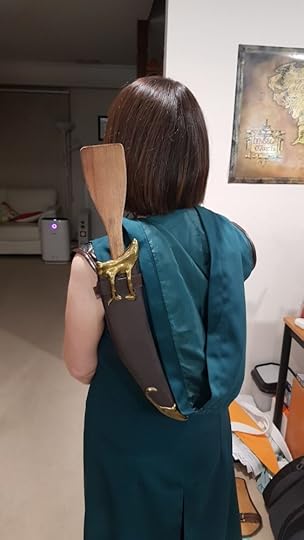 showing how cosplay daggers fit in holster