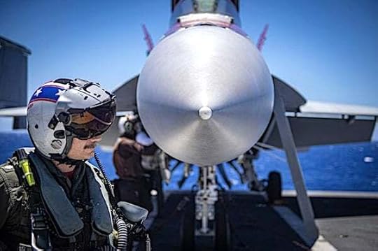 Sailors perform preflight inspections on an F/A-18F Super Hornet on the flight deck of the USS Nimitz while underway in the Pacific Ocean, Thursday, April 17, 2025. (U.S. Navy photo by Petty Officer 2nd Class Hannah Kantner)