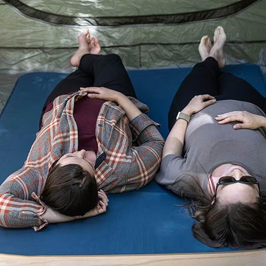 two women on exped deepsleep mat in tent