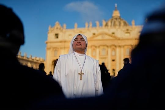 A nun waits in St. Peter's Square