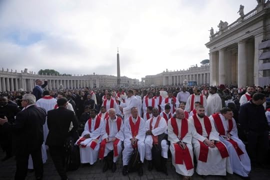 Priests take their seats ahead of the funeral of Pope Francis