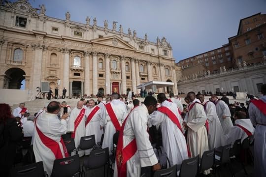 Priests take their seats ahead of the funeral of Pope Francis