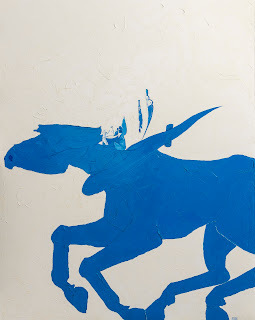 Freedom and forward energy exhibited by a large sculptural blue horse with an ankh as a collar