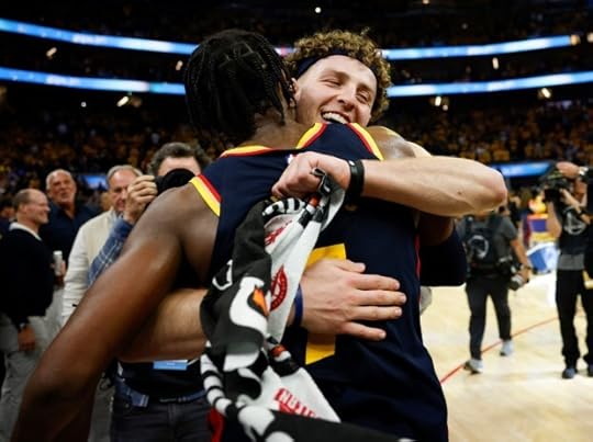 Golden State Warriors' Brandin Podziemski (2) hugs Golden State Warriors' Buddy Hield (7) after their 109-106 win over the Houston Rockets for Game 4 of the Western Conference First Round NBA Playoffs game at the Chase Center in San Francisco, Calif., on Monday, April 28, 2025. (Nhat V. Meyer/Bay Area News Group)