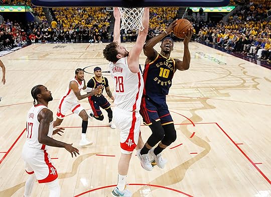 Golden State Warriors’ Jimmy Butler III (10) takes a shot...