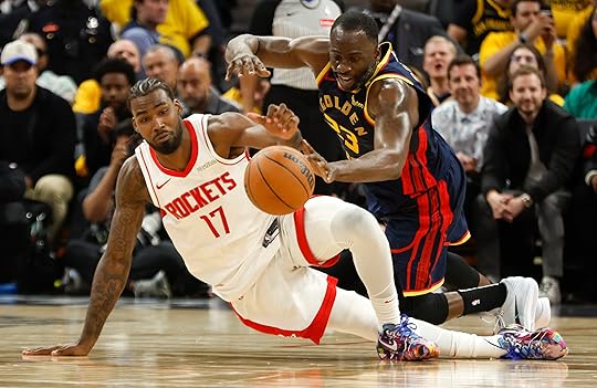 Golden State Warriors’ Draymond Green (23) fights for the ball...