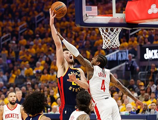 Golden State Warriors’ Quinten Post (21) is fouled by Houston...