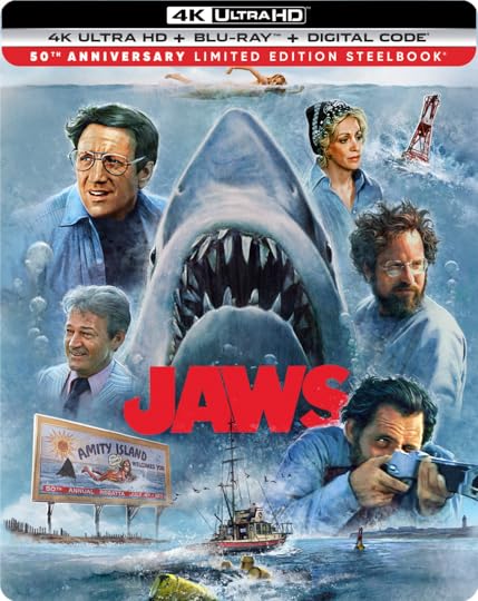 The box art for Jaws 4K Steelbook 50th anniversary release depicts the iconic shark image surrounded by Brody, Ellen, Hooper, Quint, and Mayor Vaughn.