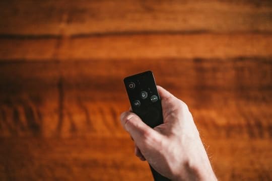 A hand holding a remove control. Recognizing what you can and do control 