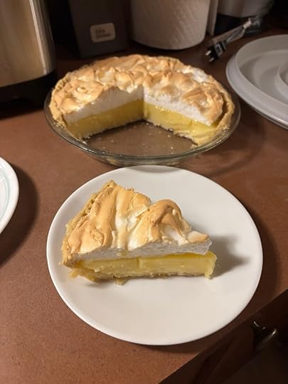 An honest-to-goodness slice of lemon meringue pie with golden peaks!