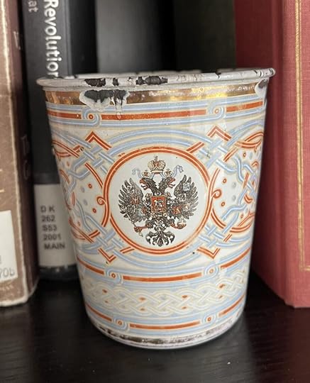 An old enameled cup from the coronation of Tsar Nicholas II with the Russian Imperial Eagle.